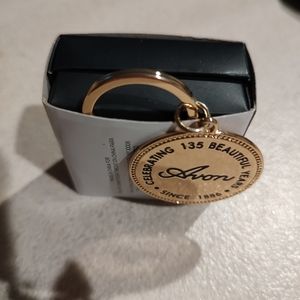 Celebrate Avon's 135th anniversary with this stunning Studio 1886 Coin Key Chain